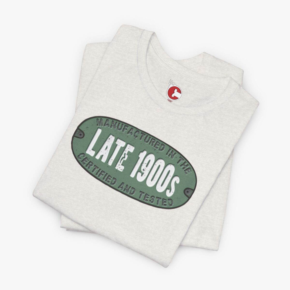 Folded view of a Manufactured In The Late 1900s t-shirt in Heather Cement