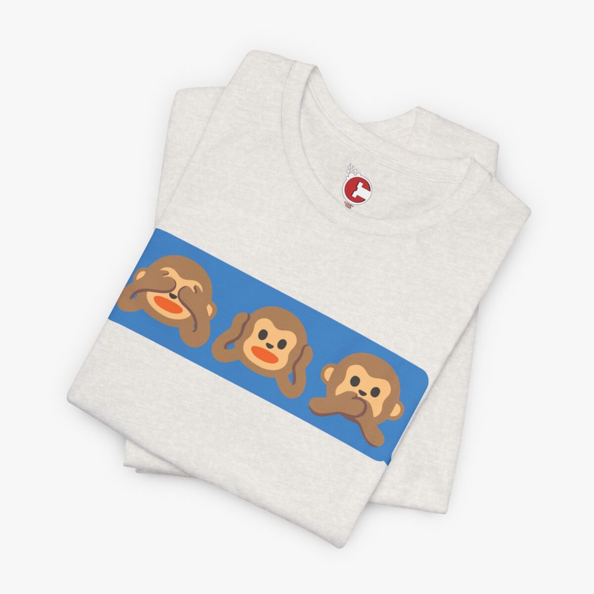 Folded view of a See No Hear No Speak No t-shirt in Heather Cement