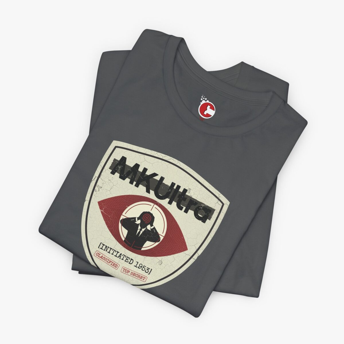 Folded view of a MKUltra Phase III t-shirt in Asphalt